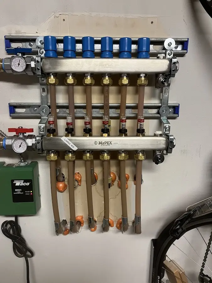 Plumber performing Gas Line Installation at a residential property in Sutton